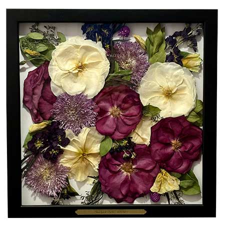 Purple and white pressed roses with black frame and custom engraving