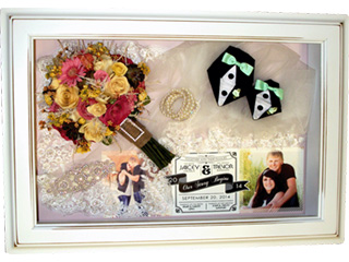 bridal bouquet preservation keepsake with lace and other wedding memorabilia